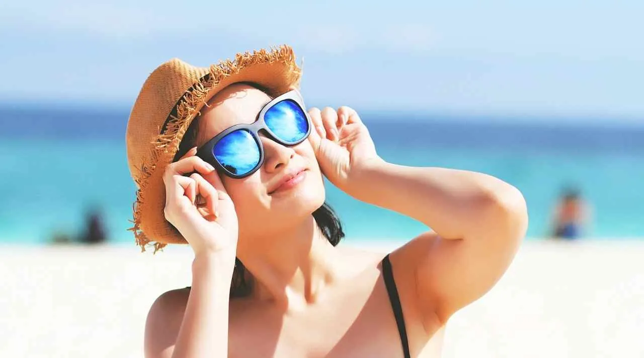 A woman wearing a pair of colour blind glasses