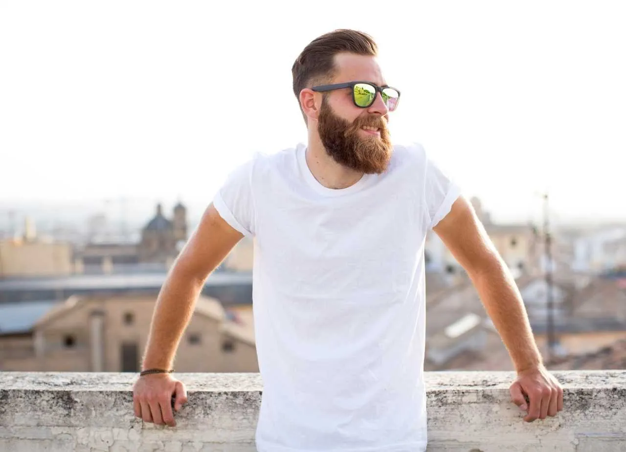 man wearing colour blind glasses